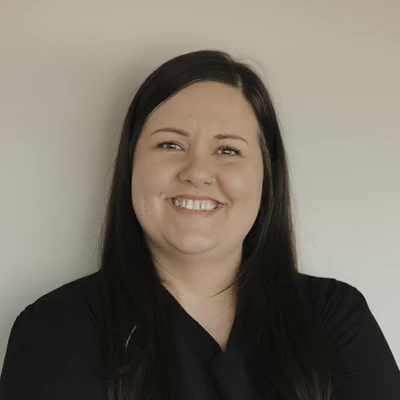 A headshot of Kim, the Office Manager at Corey Chiropractic & Acupuncture P.C.